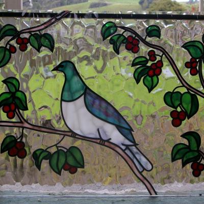 kereru with red berries leadlight llw