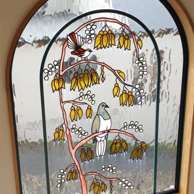installed custom leadlight with kowhai and native birds llw